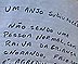 Carta  é  colada em um poste em frente ao 77 Distrito Policial
